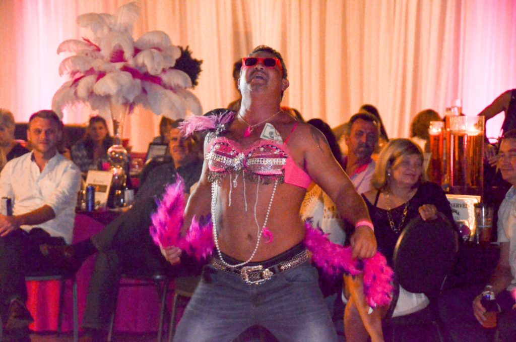 Man dancing at Bras for a Cause Gulf Coast